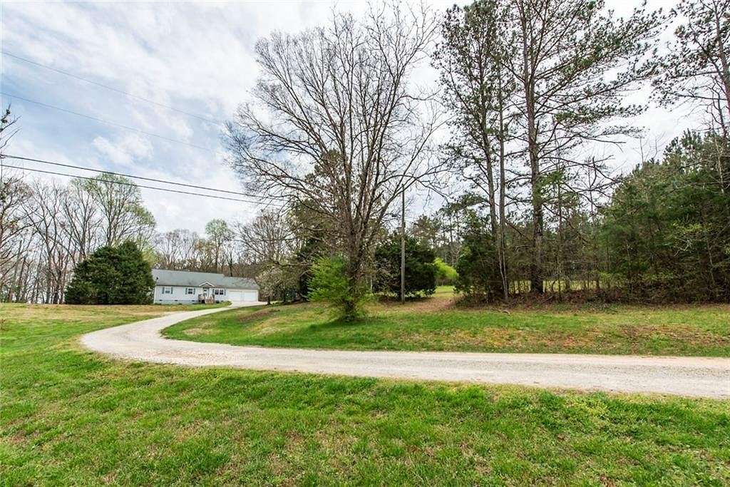 6.2 Acres of Residential Land with Home for Sale in Carrollton, Georgia