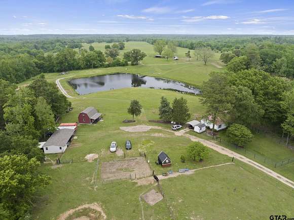 124.97 Acres of Agricultural Land with Home for Sale in Leesburg, Texas