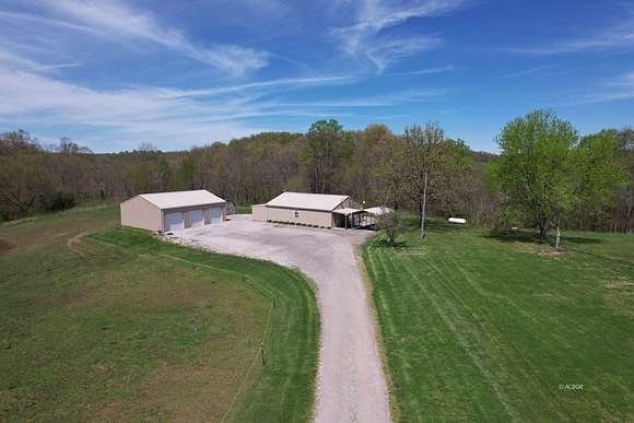 145 Acres of Land with Home for Sale in Long Bottom, Ohio