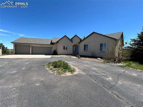 5.1 Acres of Land with Home for Sale in Colorado Springs, Colorado
