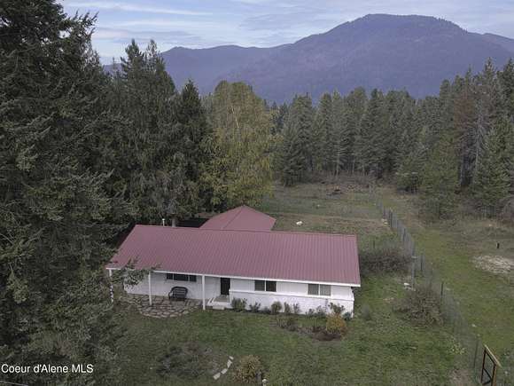 5 Acres of Residential Land with Home for Sale in Clark Fork, Idaho