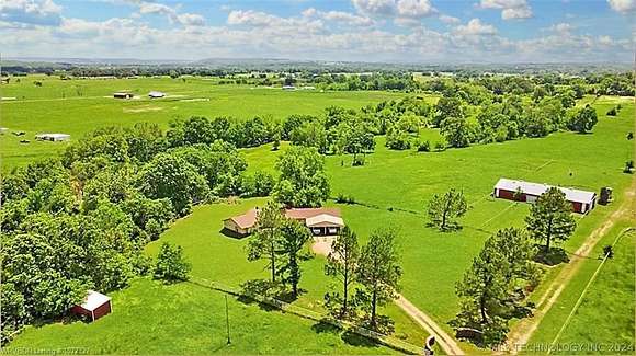 147 Acres of Agricultural Land with Home for Sale in Sallisaw, Oklahoma
