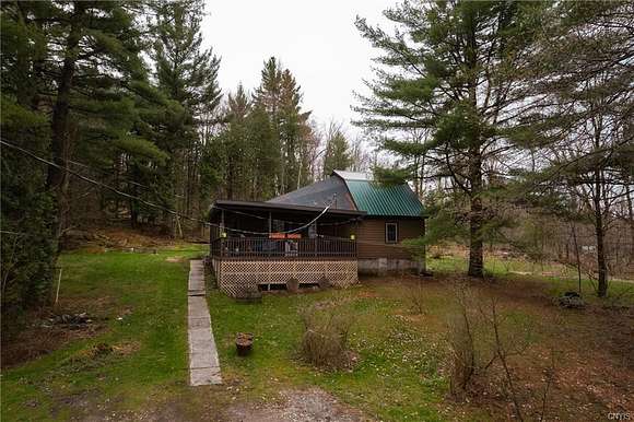 54.9 Acres of Recreational Land with Home for Sale in Natural Bridge, New York