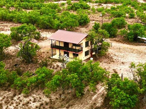 22.9 Acres of Agricultural Land with Home for Sale in El Indio, Texas