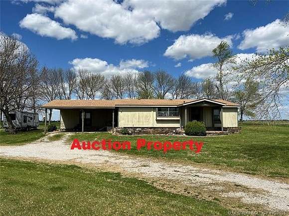 3 Acres of Residential Land with Home for Auction in Vinita, Oklahoma