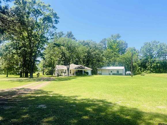 6.9 Acres of Residential Land with Home for Sale in Rusk, Texas