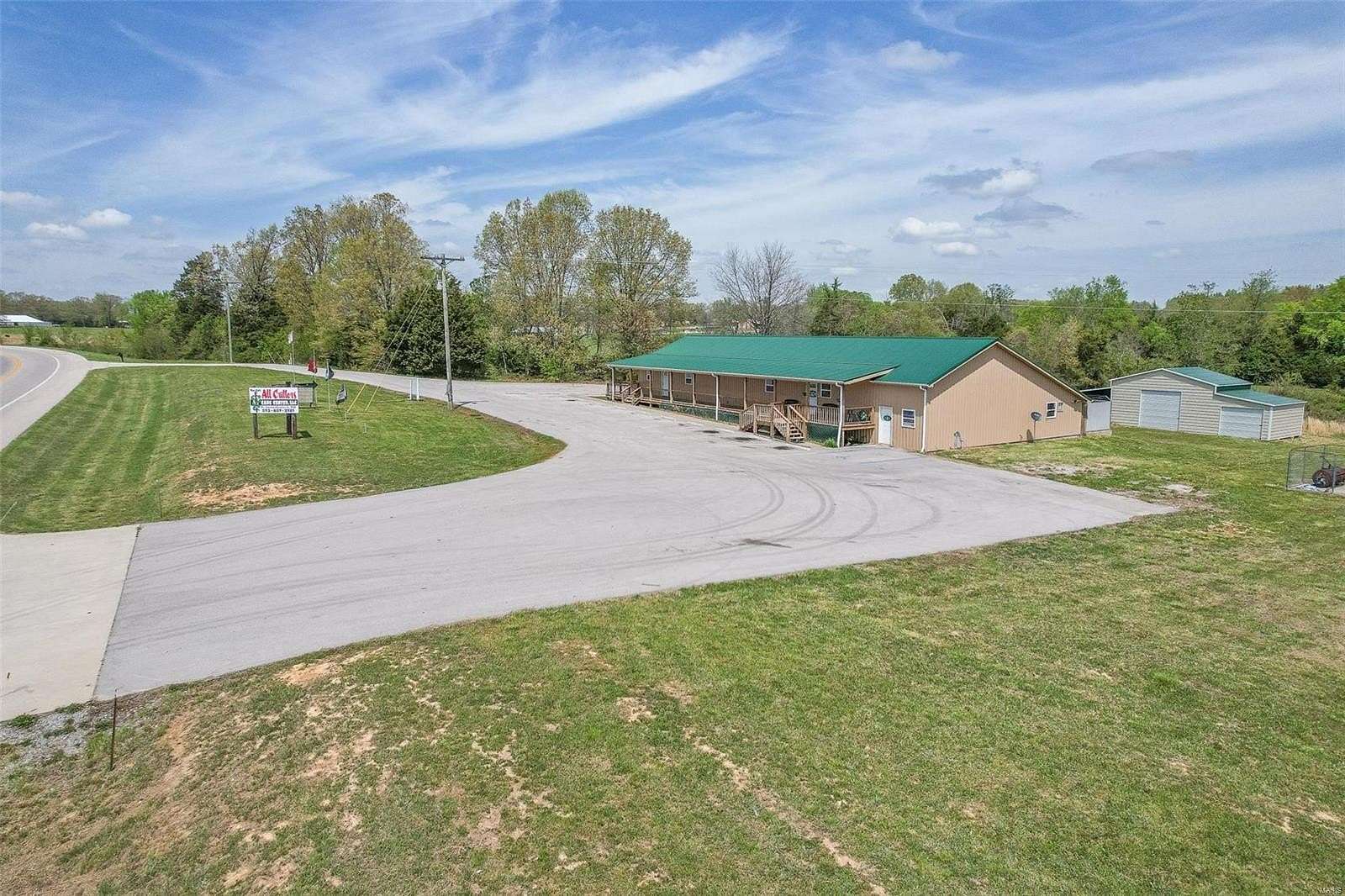 7.5 Acres of Improved Commercial Land for Sale in Fairdealing, Missouri