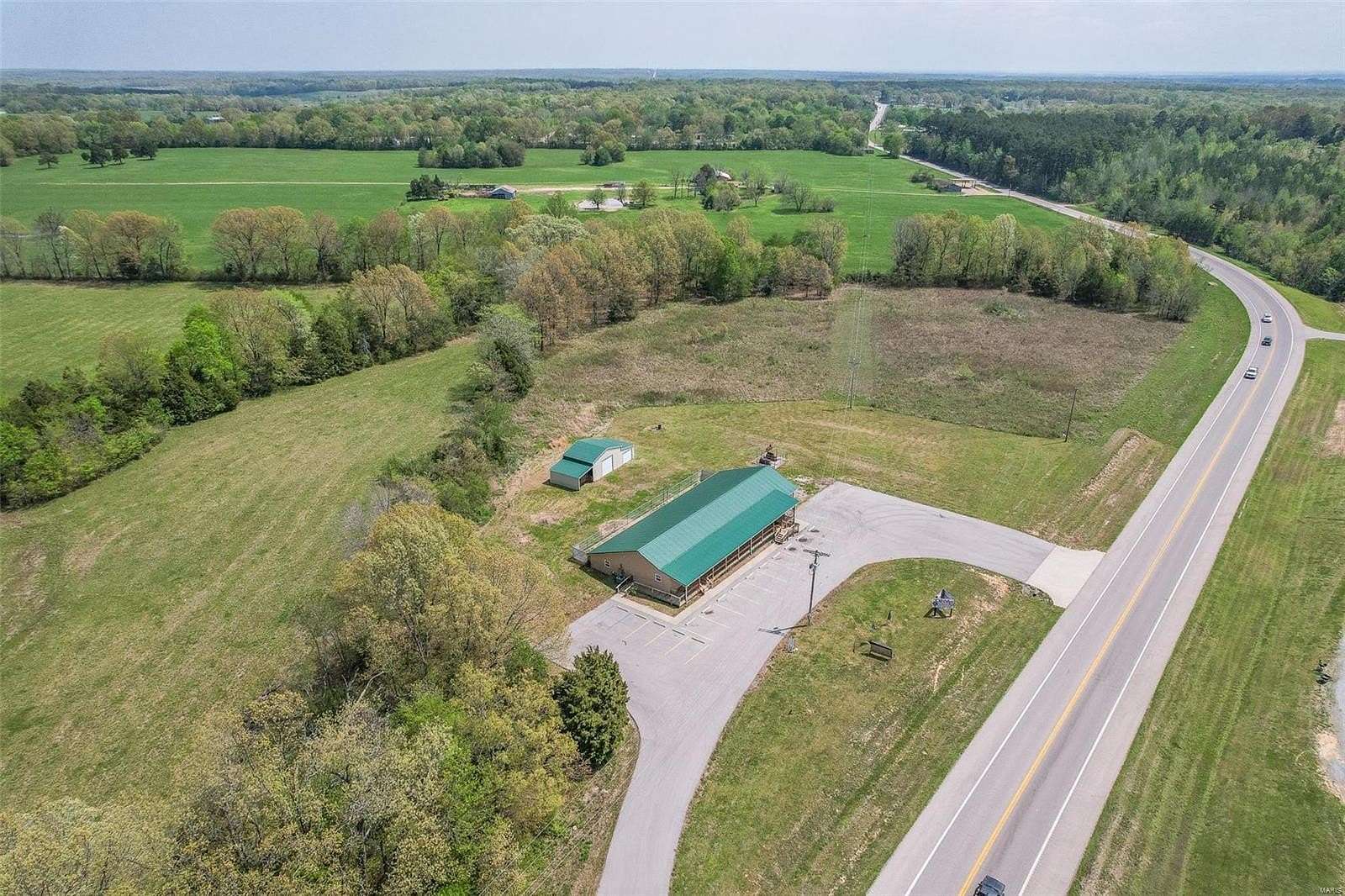 7.5 Acres of Improved Commercial Land for Sale in Fairdealing, Missouri