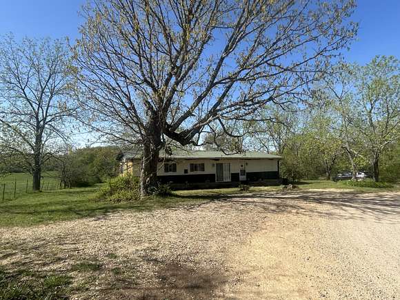 9.9 Acres of Residential Land with Home for Sale in Willow Springs, Missouri