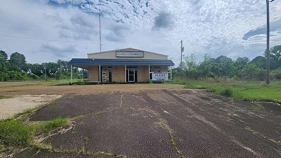 20.3 Acres of Improved Commercial Land for Sale in Lone Star, Texas