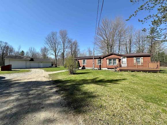 8.1 Acres of Residential Land with Home for Sale in Shepherd, Michigan