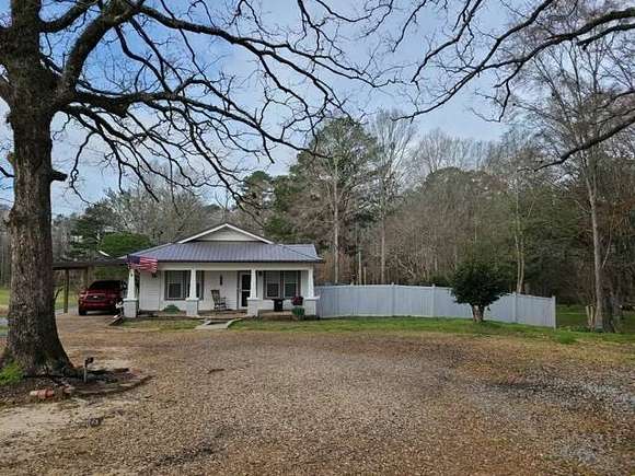 14.4 Acres of Land with Home for Sale in Jena, Louisiana