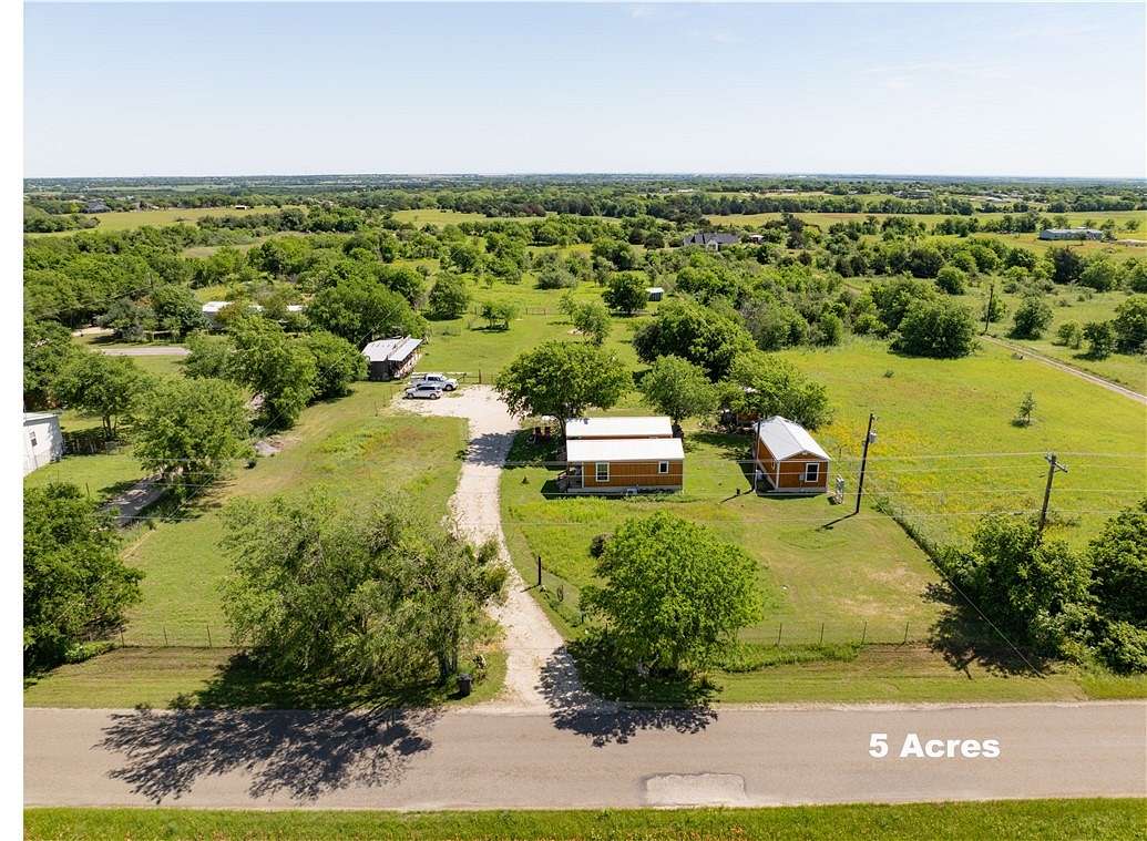 5 Acres of Residential Land with Home for Sale in Bruceville, Texas