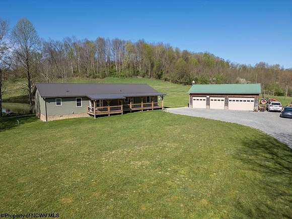 26.4 Acres of Agricultural Land with Home for Sale in Belington, West Virginia
