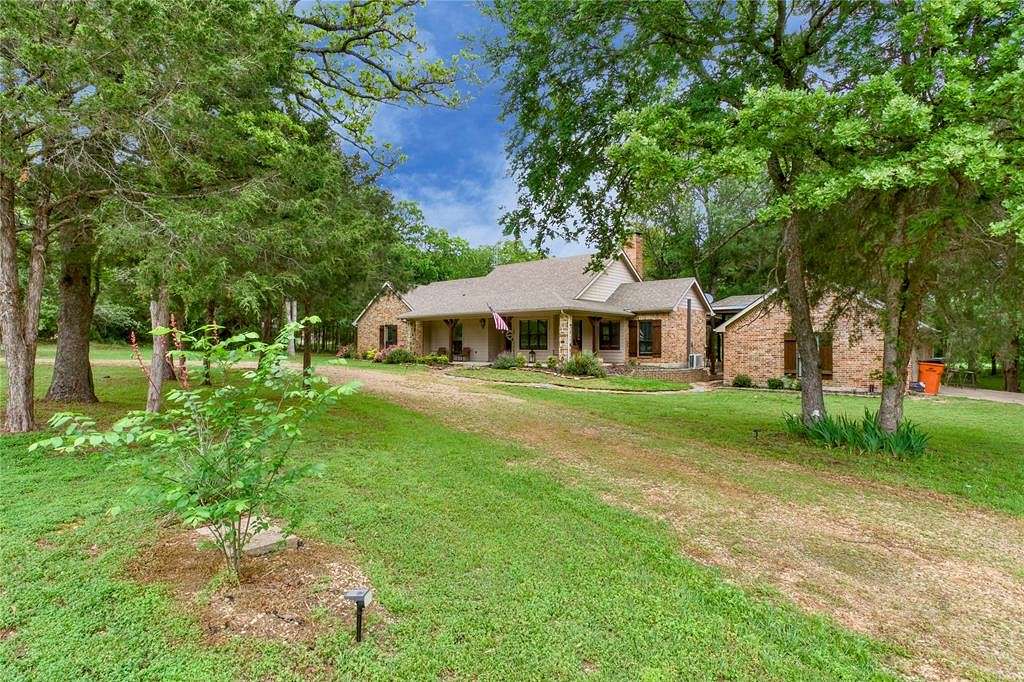 3.4 Acres of Residential Land with Home for Sale in Quinlan, Texas
