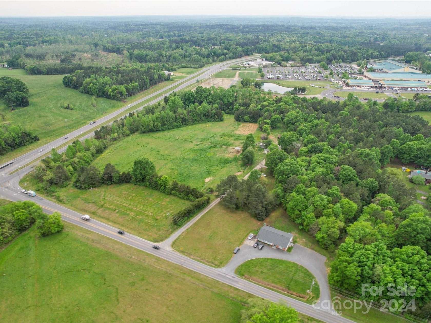 4.957 Acres of Residential Land with Home for Sale in Concord, North Carolina