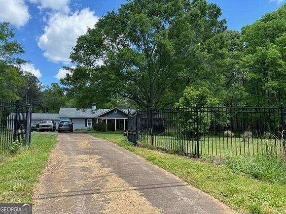 2.3 Acres of Residential Land with Home for Sale in Flowery Branch, Georgia