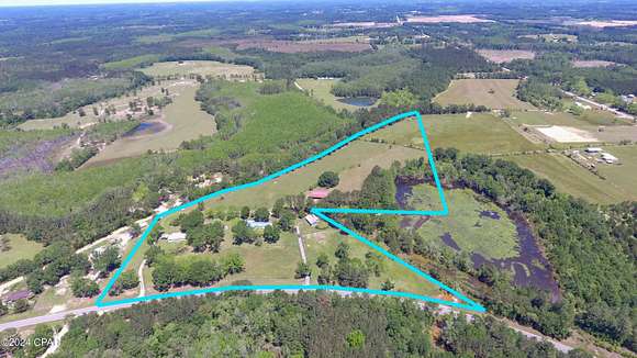 23.9 Acres of Agricultural Land with Home for Sale in Bonifay, Florida