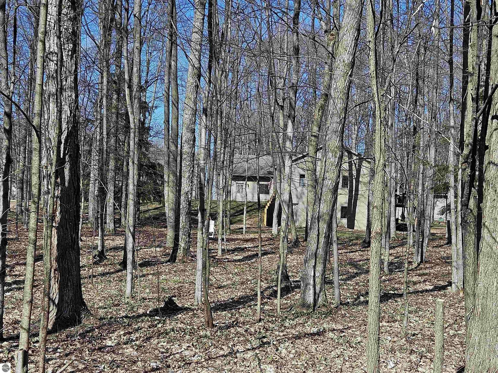 2.5 Acres of Residential Land with Home for Sale in Kingsley, Michigan