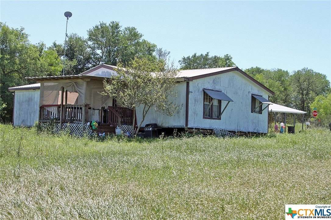 10.219 Acres of Land with Home for Sale in Lockhart, Texas