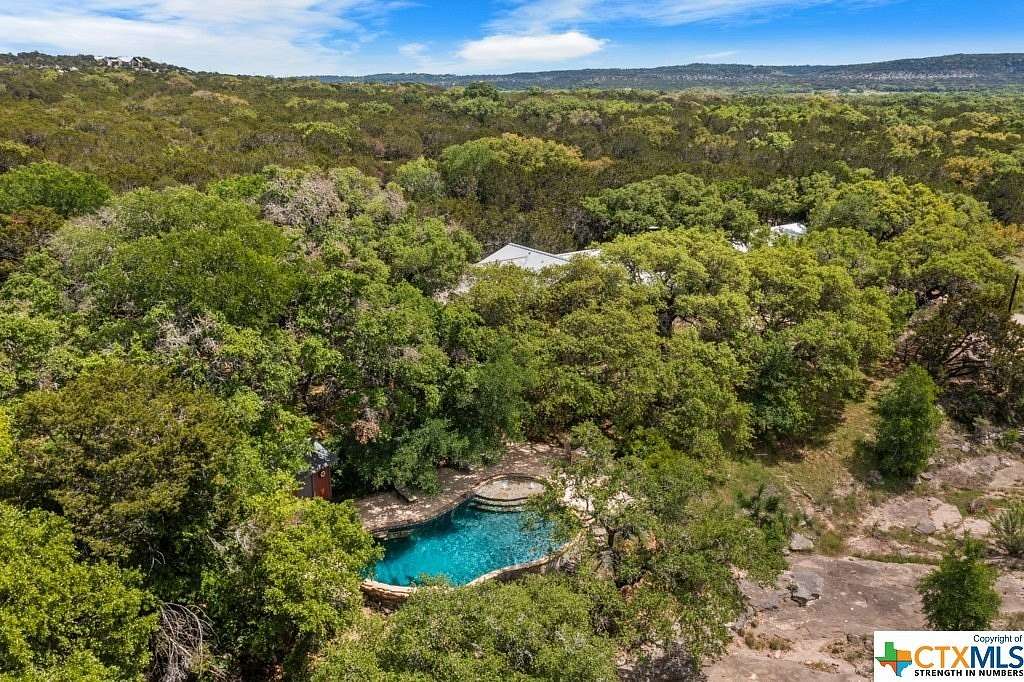 8.01 Acres of Residential Land with Home for Sale in Wimberley, Texas