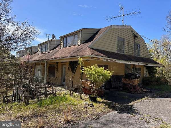 5.25 Acres of Residential Land with Home for Sale in Berkeley Springs, West Virginia