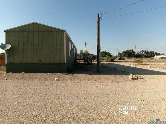 7.3 Acres of Residential Land with Home for Sale in Carlsbad, New Mexico