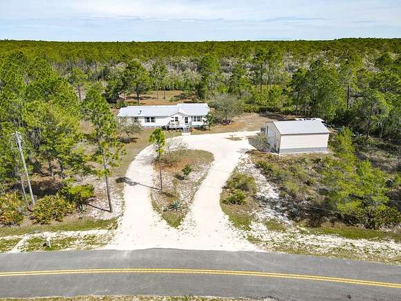 2 Acres of Residential Land with Home for Sale in Carrabelle, Florida