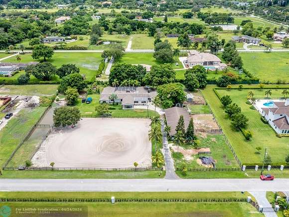 2.3 Acres of Residential Land with Home for Sale in Southwest Ranches, Florida