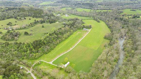 97.6 Acres of Agricultural Land with Home for Sale in Nicholasville, Kentucky