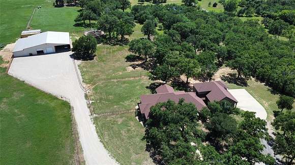 28.087 Acres of Agricultural Land with Home for Sale in Millsap, Texas