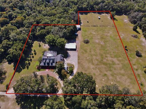 5.64 Acres of Land with Home for Sale in Geneva, Florida