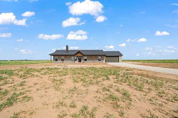 10 Acres of Land with Home for Sale in Slaton, Texas