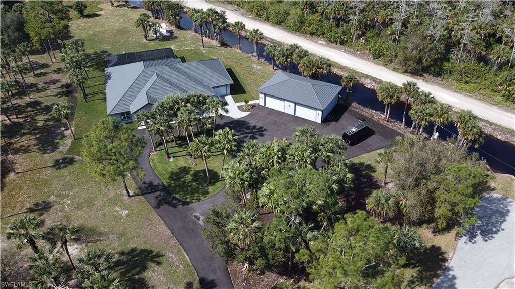4.7 Acres of Residential Land with Home for Sale in Naples, Florida
