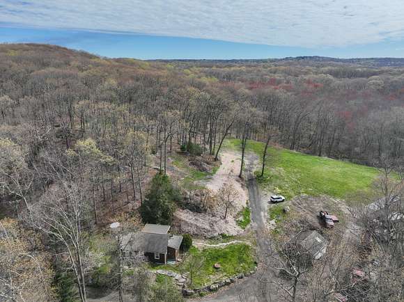 17.9 Acres of Land with Home for Sale in Newtown, Connecticut
