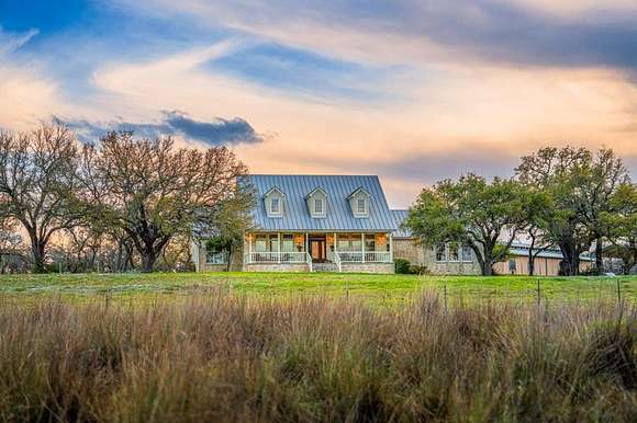 148 Acres of Agricultural Land with Home for Sale in Fredericksburg, Texas