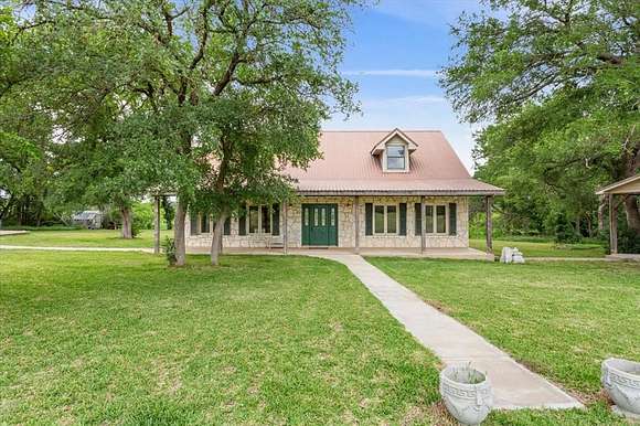 16.9 Acres of Land with Home for Sale in Evant, Texas