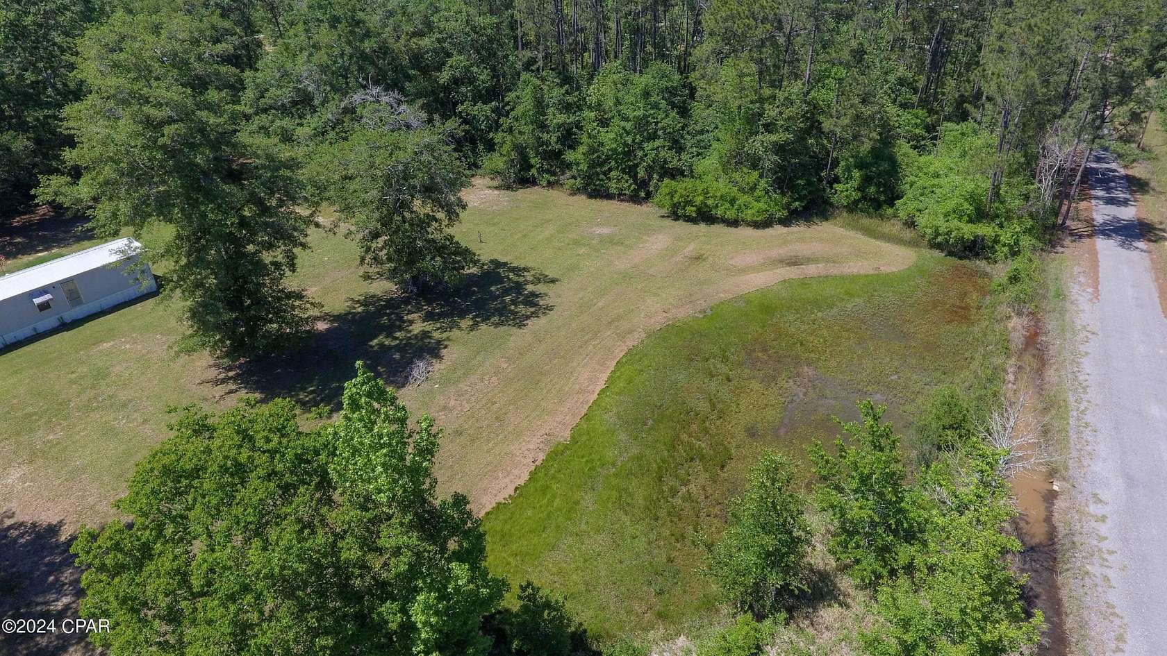 2 Acres of Residential Land with Home for Sale in Chipley, Florida