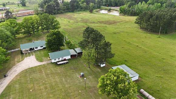 30.4 Acres of Land with Home for Sale in Bismarck, Arkansas