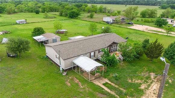 2.9 Acres of Residential Land with Home for Sale in Sulphur Springs, Texas