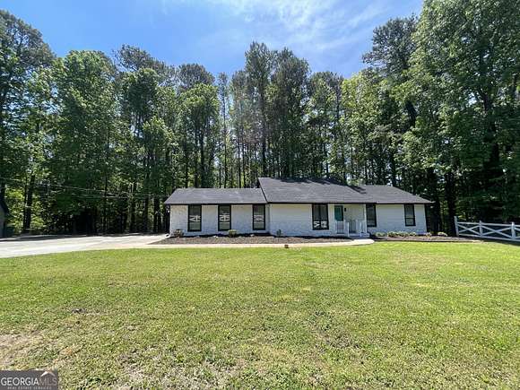 8 Acres of Residential Land with Home for Sale in Lithonia, Georgia