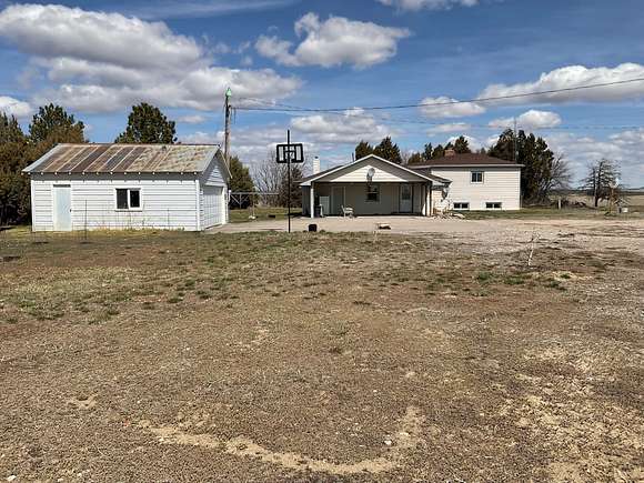 5.5 Acres of Residential Land with Home for Sale in Fort Laramie, Wyoming