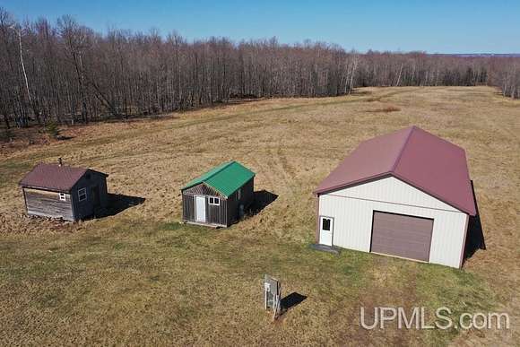 92 Acres of Land with Home for Sale in Baraga, Michigan