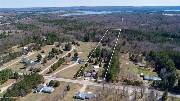 4.9 Acres of Residential Land with Home for Sale in Alanson, Michigan