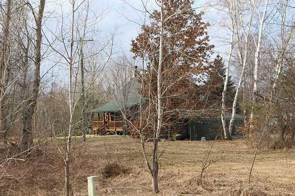 6.9 Acres of Residential Land with Home for Sale in Harrison, Michigan