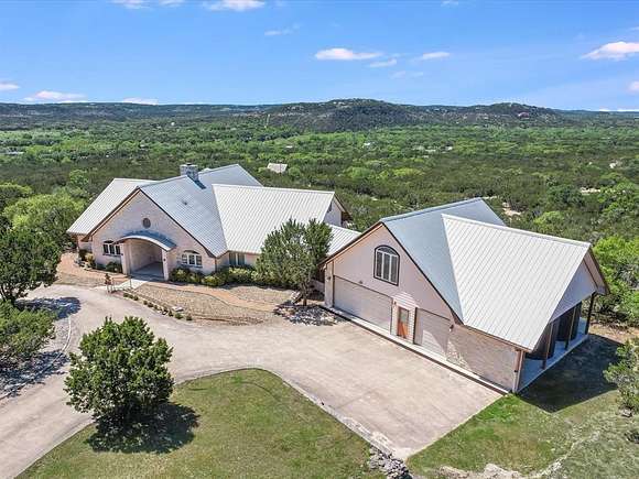 16.697 Acres of Land with Home for Sale in Wimberley, Texas