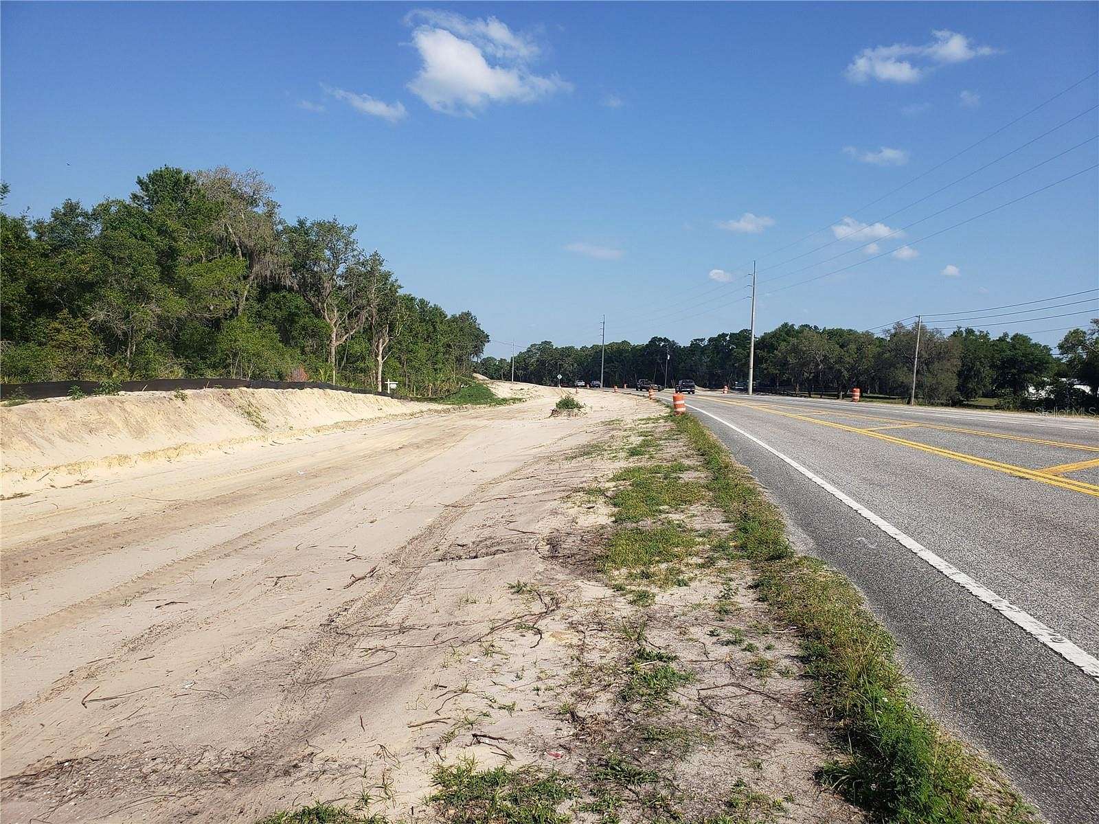 0.89 Acres of Commercial Land for Sale in De Leon Springs, Florida