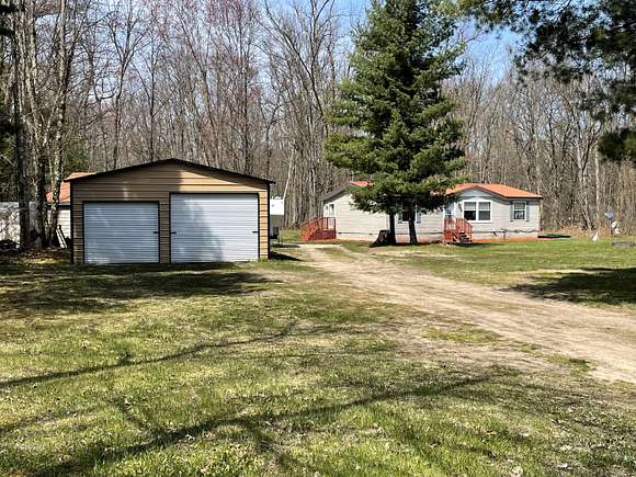 8.7 Acres of Residential Land with Home for Sale in Bitely, Michigan
