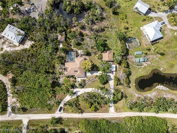 2.499 Acres of Residential Land with Home for Sale in St. James City, Florida