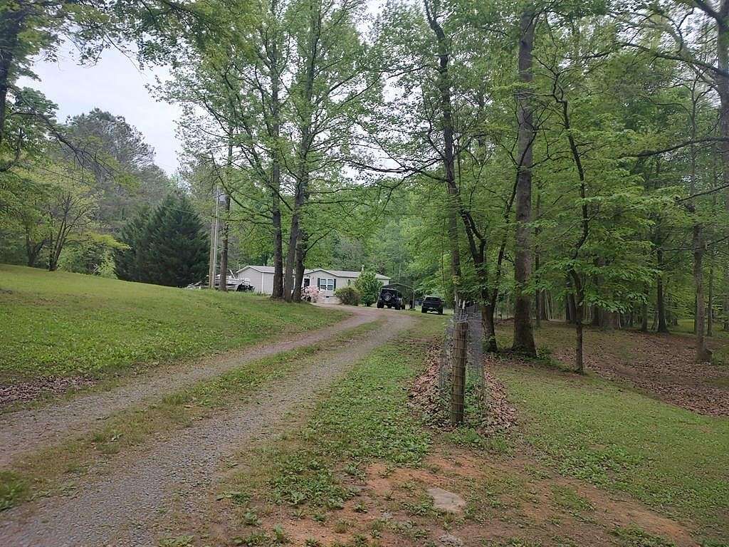 6.3 Acres of Residential Land with Home for Sale in Dalton, Georgia